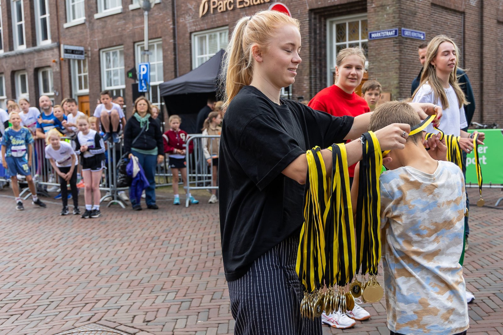 Vrijwilligers bij start en finish